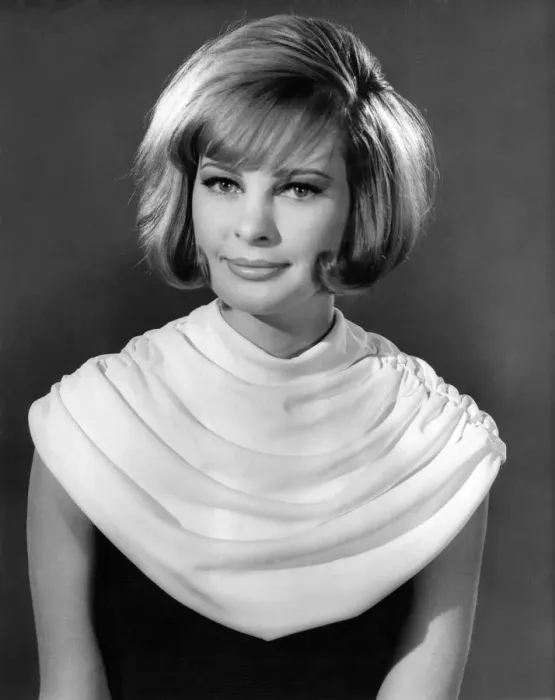 Framed Print : Model wearing a white neck scarf January 1963 P007634 Framed Print : Model wearing a white neck scarf January 1963 P007634