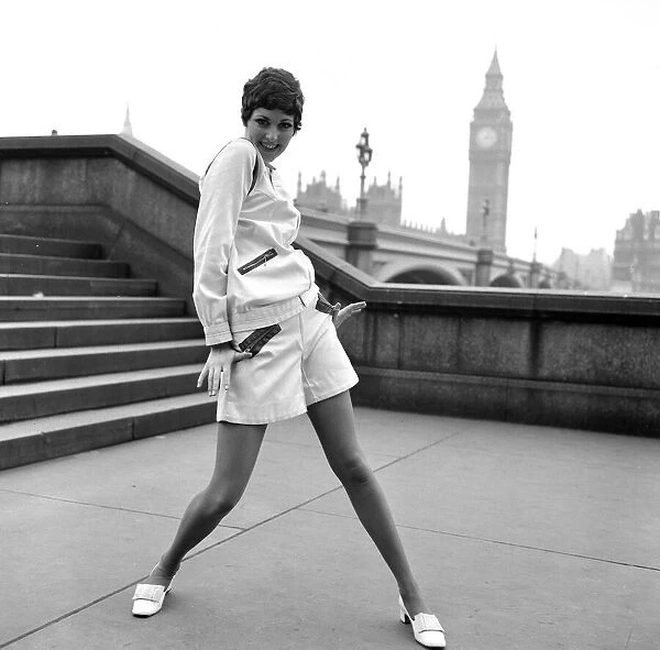 A model wears The Mary Quant Zipper Outfit, here, by the Thames at Westminster