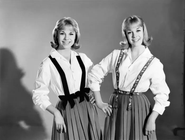 Framed Print : Models: Baker Twins wearing braces. July 1962