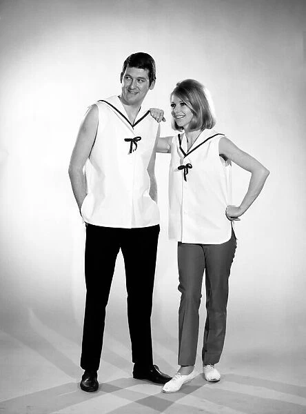Models Mike Lester and Jill Carter wearing his and her naval fashion shirt 1966
