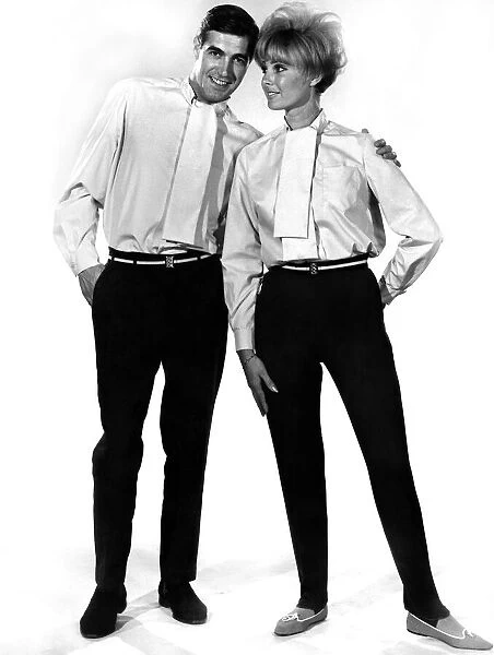 Models Peter Christian and Yvette Davies posing wearing shirt and tie