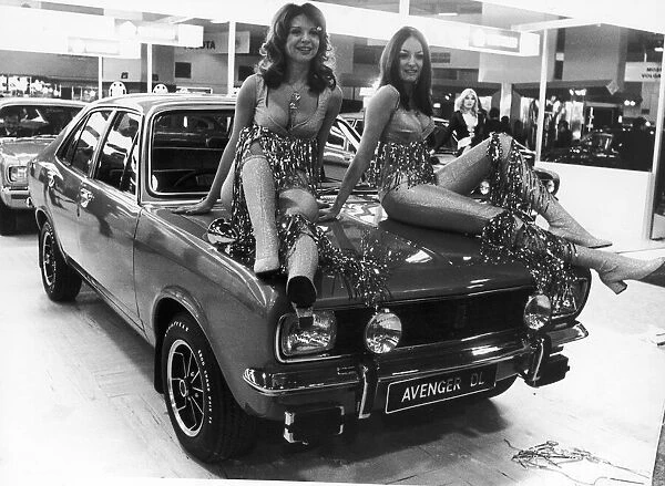 Two models pose on the bonnet of the Chrysler Avenger DL at the 1972 Motor Show at Earls