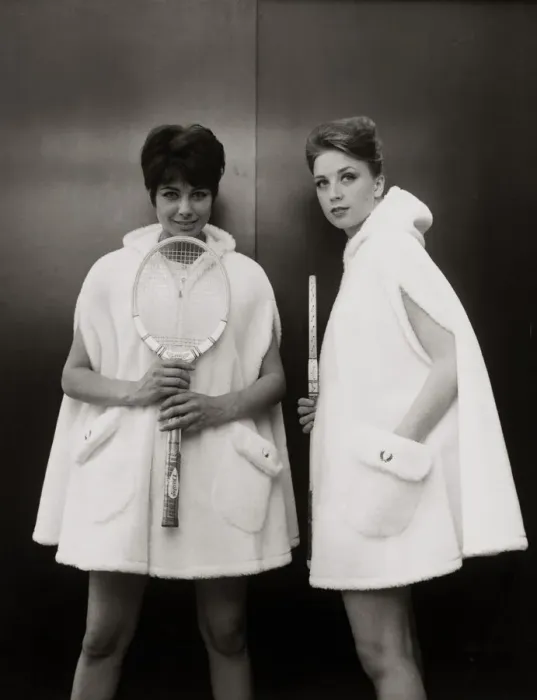 Framed Print : Models Sandra Russell (left) and Judy Wilson showing a zip-up hooded cape in fur fabric Framed Print : Models Sandra Russell (left) and Judy Wilson showing a zip-up hooded cape in fur fabric