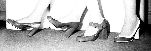 Models showing off some shoes from July 1970