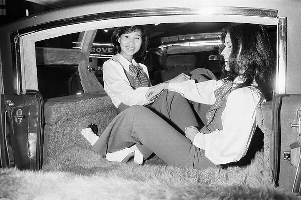 Models sitting in a fur lined estate car at the 1973 Geneva Motor Show