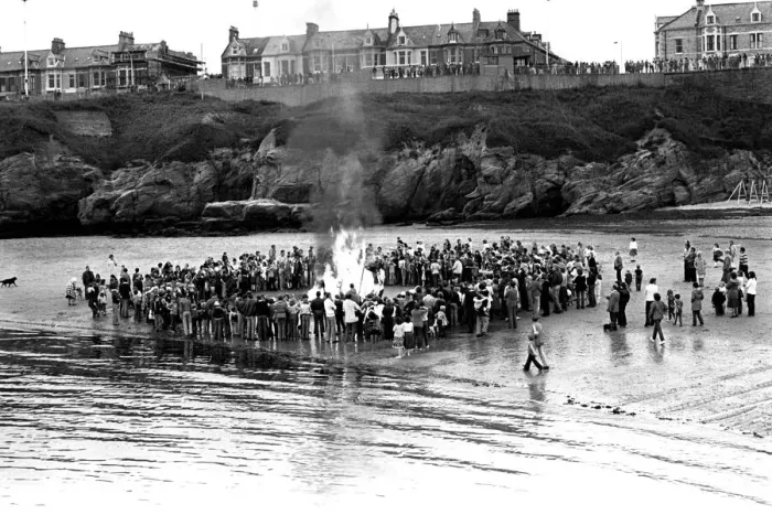 Framed Print : Models of Viking longships are burnt on the beach at Cullercoats Bay in July 1980