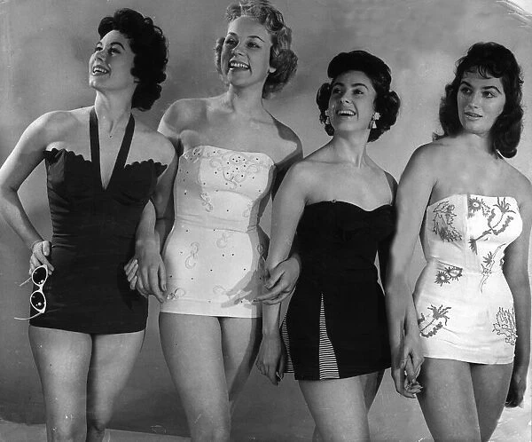 Models wearing swimsuit designs 1955