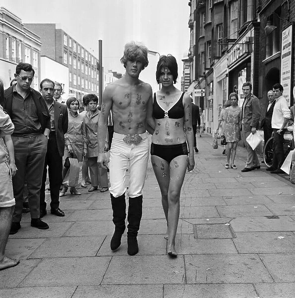 Models wearing tattoo transfers. 1967