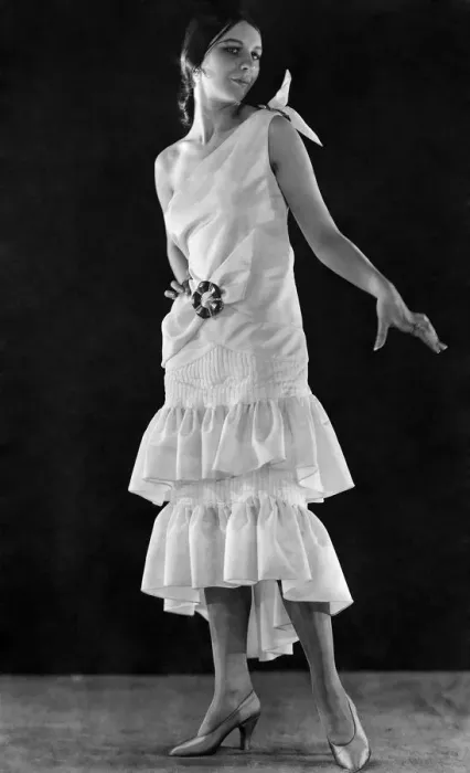 Framed Print : A modern gown reminiscent of the eighties in ivory faille with buckles of jade Framed Print : A modern gown reminiscent of the eighties in ivory faille with buckles of jade