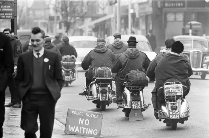 Framed Print : Mods on their scooters seen here leaving Clacton at the end of the bank holiday weekend Framed Print : Mods on their scooters seen here leaving Clacton at the end of the bank holiday weekend