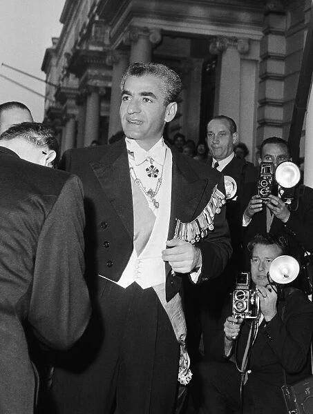 Mohammad-Reza Shah Pahlavi, the Shah of Iran, arrives at the Iranian Embassy for a