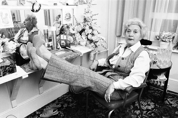 Molly Sugden relaxing in her dressing room. 17th August 1980