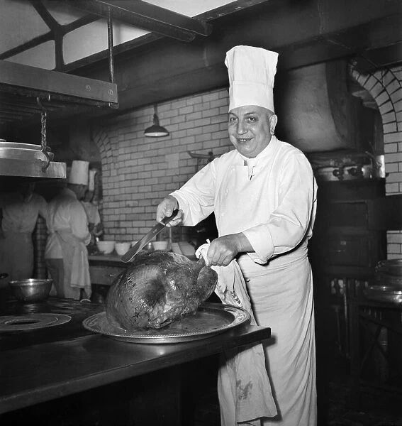 Monsieur Alban, lead chef at Savoy Hotel, with turkey. December 1949 O21983-001