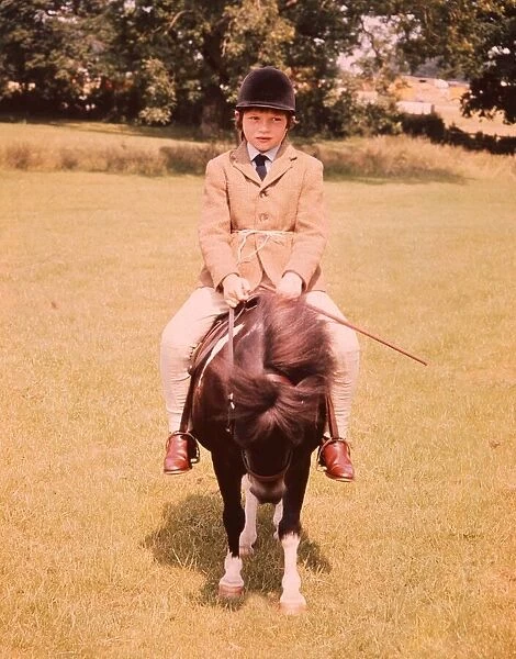 Moorland and Mountain Pony class at hiockstead. A young child riding on top of the pony