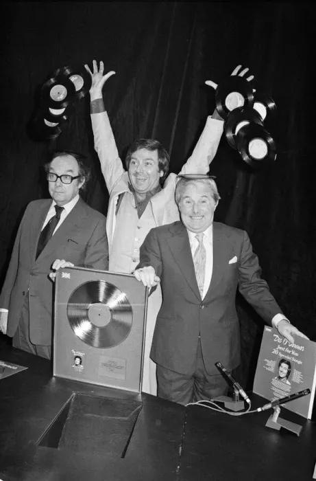 Framed Print : Morecambe and Wise present Des O Connor with a golden disc to mark 100000 sales of Framed Print : Morecambe and Wise present Des O Connor with a golden disc to mark 100000 sales of