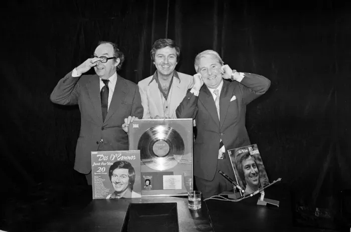 Framed Print : Morecambe and Wise present Des O Connor with a golden disc to mark 100000 sales of