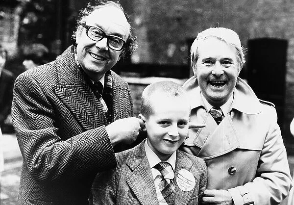 Morecambe And Wise with one of the winners of a children of courage award
