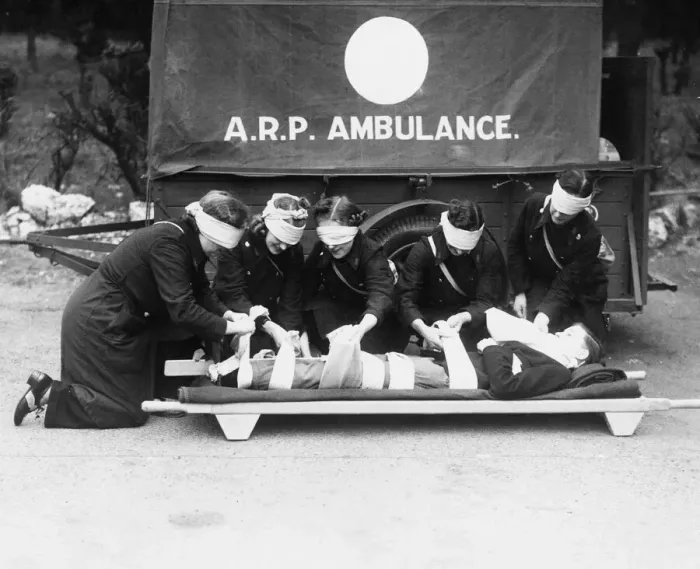 Framed Print : Morris Ambulance Department trainees attend to a casualty during a training exercise Framed Print : Morris Ambulance Department trainees attend to a casualty during a training exercise