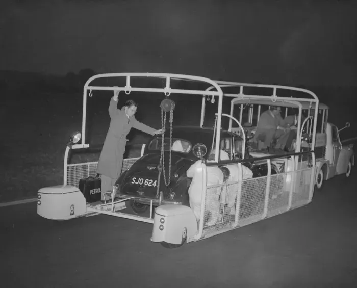 Framed Print : A Morris Austin Minor car having repairs carried out in the mobile garage