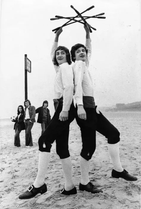 Framed Print : Morris dancing brothers Timothy and Nicholas Bristow practice on the beach at Whitley Bay