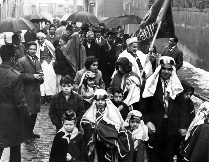 Framed Print : Moslems form a procession in Gladstone Street before marching down Bute Street to Framed Print : Moslems form a procession in Gladstone Street before marching down Bute Street to