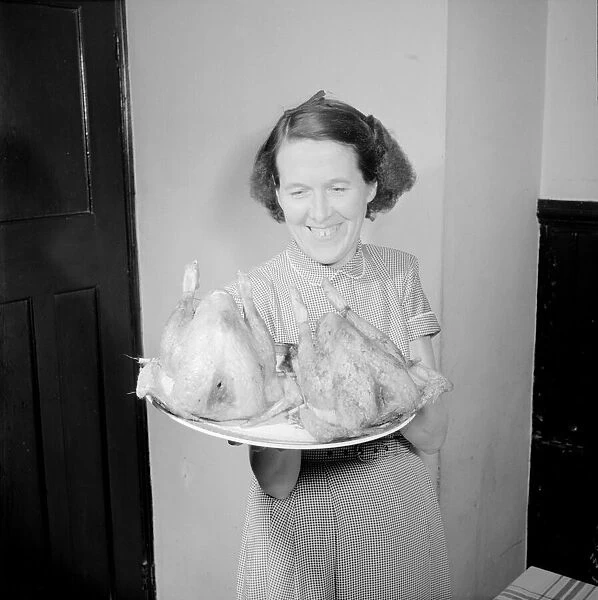 Mother brings in Sunday Roast lunch Circa 1957