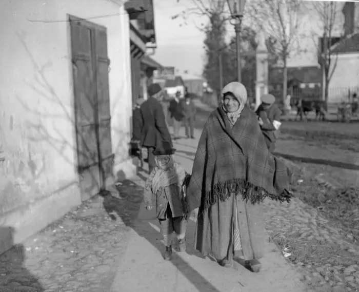 Framed Print : Mother and child in traditional dress seen here in the village of Halicz, in Galicia