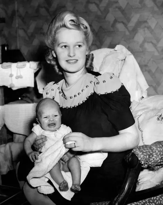 Framed Print : Mother at home with baby during the war. December 1944 P010076