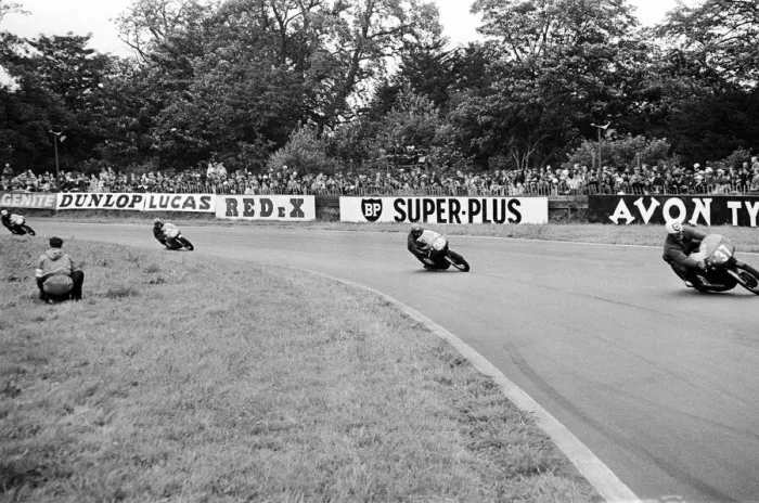 Framed Print : Motor Cycle Racing at oulton Park. A bunch of bikes at Old Hall corner during Framed Print : Motor Cycle Racing at oulton Park. A bunch of bikes at Old Hall corner during