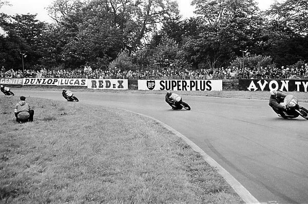 Motor Cycle Racing at oulton Park. A bunch of bikes at Old Hall corner during