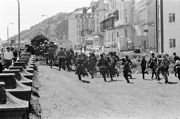 Motor cycle rowdies in Folkestone. Pictured, running through the gardens of the Royal