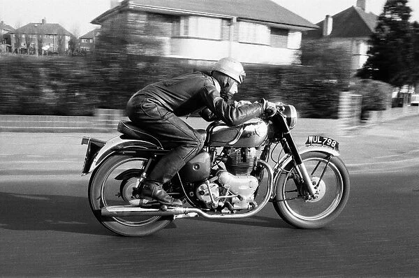 A motor cyclist at speed on a section of the Sidcup by-pass, Kent