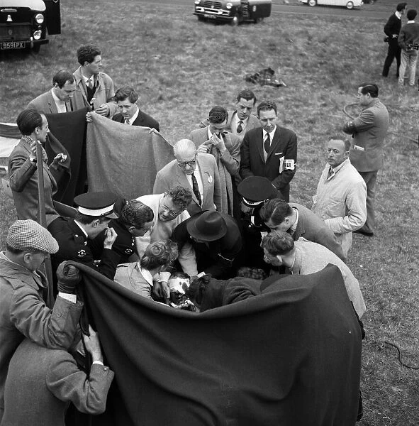Motor races at Goodwood. Ace racing driver Stirling Moss had a miracle escape from death