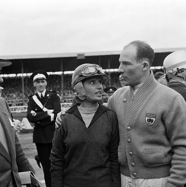 Motor racing at Silverstone. Stirling Moss expressing his sympathies to Maria Teresa de