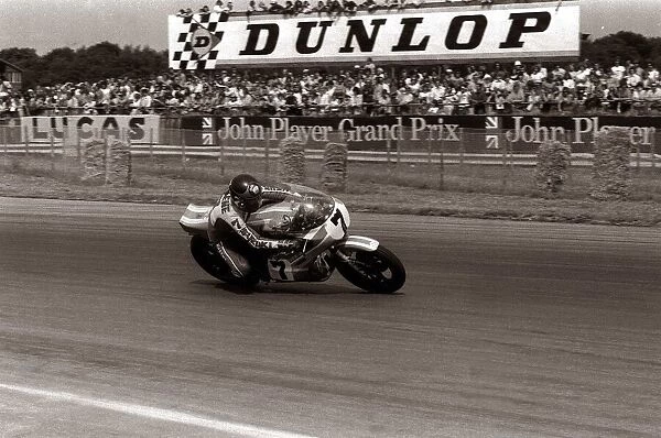 Motorcycle racing champion Barry Sheene in action during John Player Grand Prix at