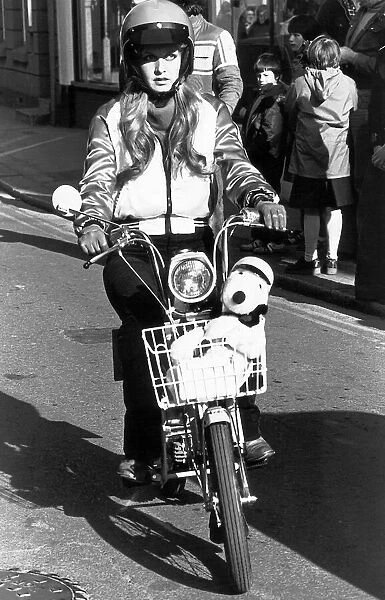 MotorCycles - Twiggy shows how simple the moped is to drive April 1978