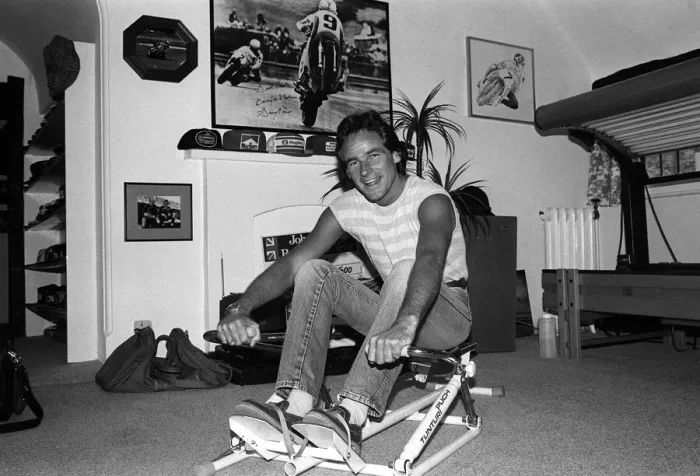 Framed Print : Motorcyclist Barry Sheene at home working out 1984 on rowing machine Framed Print : Motorcyclist Barry Sheene at home working out 1984 on rowing machine