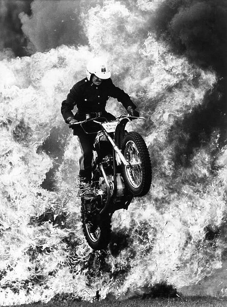 A motorcyclist from the Royal Signals Display Team (The White Helmets