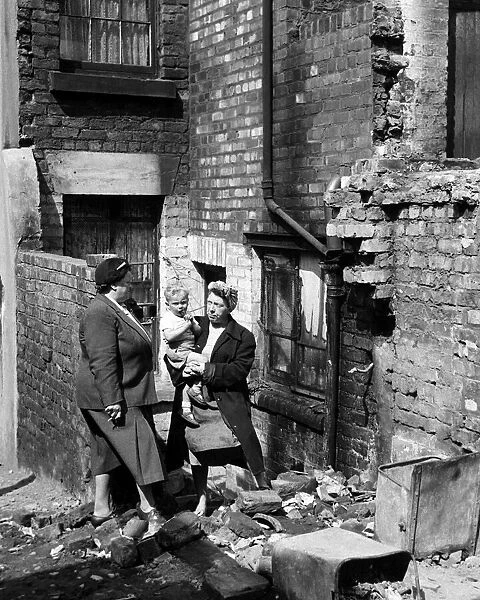 MP Bessie Braddock meeting residents in a Liverpool slum housing area