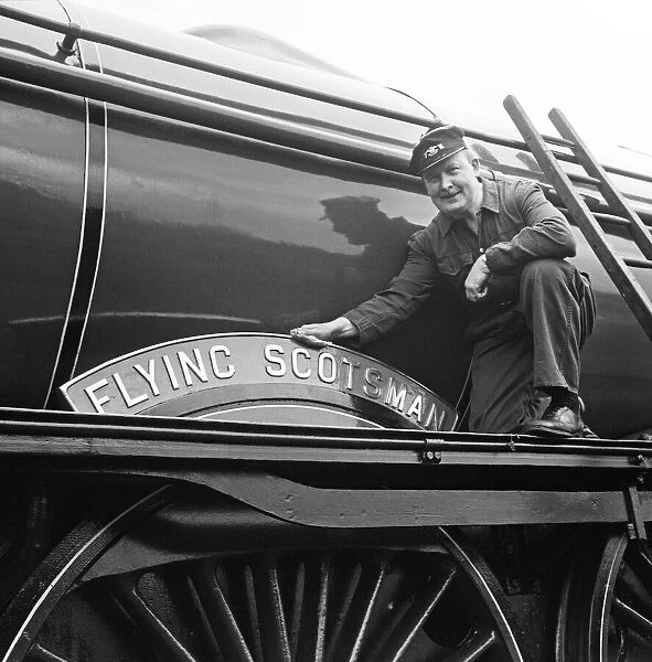 Mr Alan Pegler pictured cleaning The Flying Scotsman Engine name plate