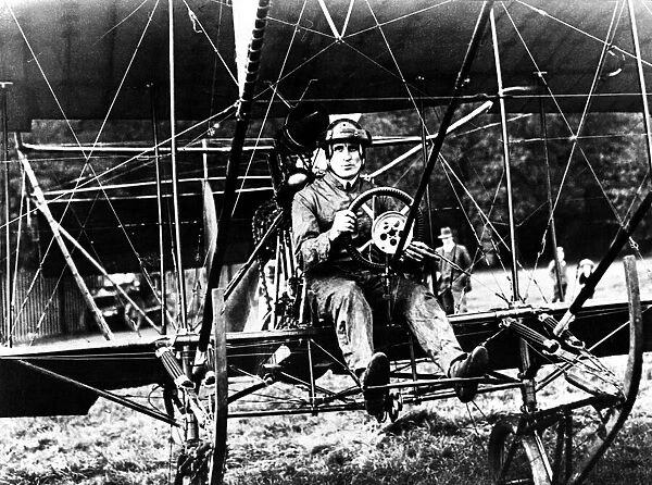 Mr Arthur George, of Newcastle, in one of the early flights in his homemade biplane
