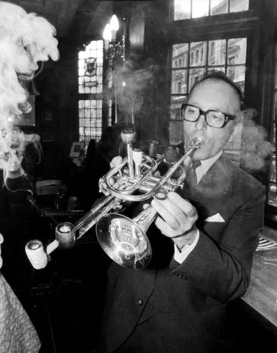 Framed Print : Mr Brian Cole winner of the Remarkable Pipe Contest seen here smoking  /  playing his