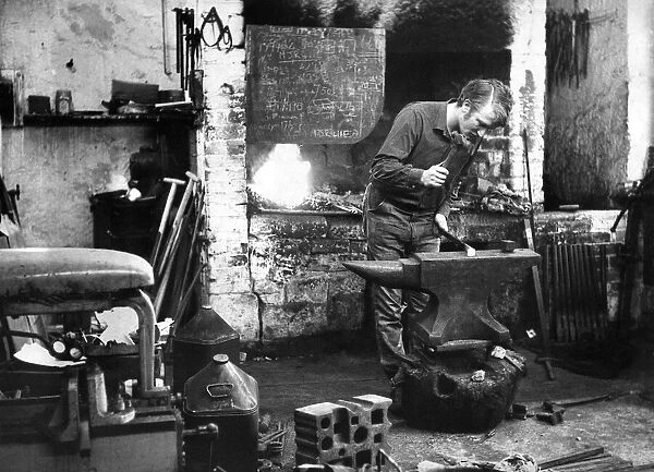 Mr. Charlton Amos working in his blacksmiths workshop at Heddon-on-the-Wall