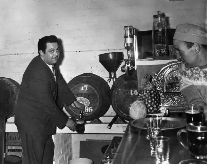 Framed Print : Mr. Don Fraser, landlord of the Wellington Hotel in Eccles now draws from the wood in his Framed Print : Mr. Don Fraser, landlord of the Wellington Hotel in Eccles now draws from the wood in his