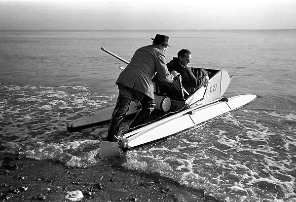 Mr. Du - Preaine setting out on crop channel trip in pedal boat. January 1953 D437-001