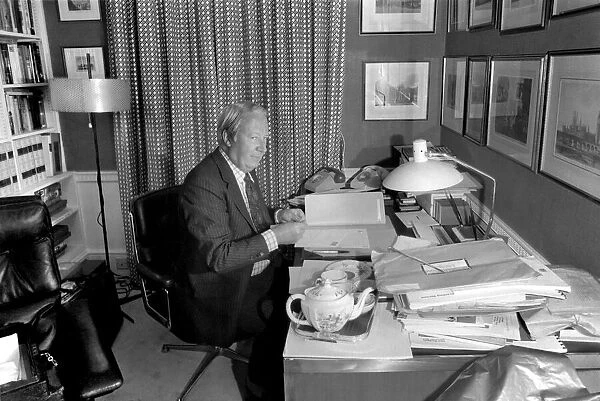 Mr. Edward Heath at home. Mr. Edward Heath, Leader of the Opposition signing letters at