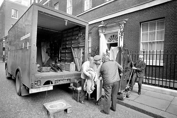 Mr. Edward Heaths baby grand piano is removed from No. 10 Downing Street. After Mr