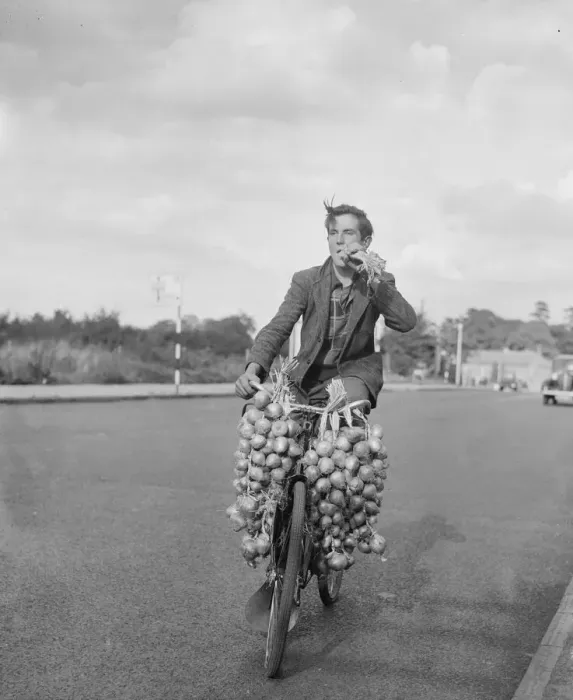 Framed Print : Mr Gallou Pierre seen here after just arriving in Bristol with his onion which he takes Framed Print : Mr Gallou Pierre seen here after just arriving in Bristol with his onion which he takes