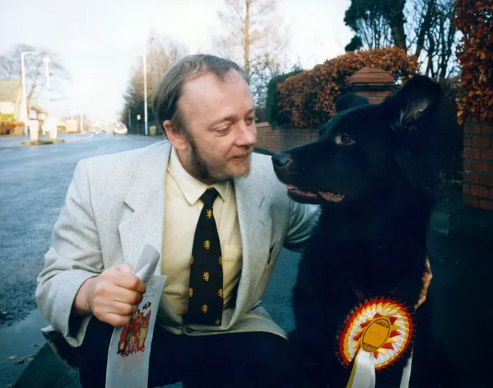 Framed Print : Mr Gary Hinson with his dog Paddy who plays the dog bought by Jack Duckworth for his wife