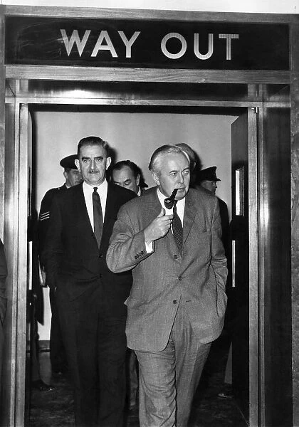 Mr. Harold Wilson and Mr. Herbert Bowden entering the conference room at London Airport